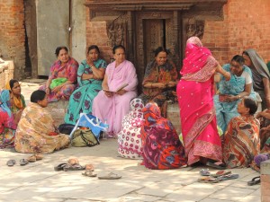 Nepalese women in their beautiful brightly coloured saris on the streets of Kathmandu.